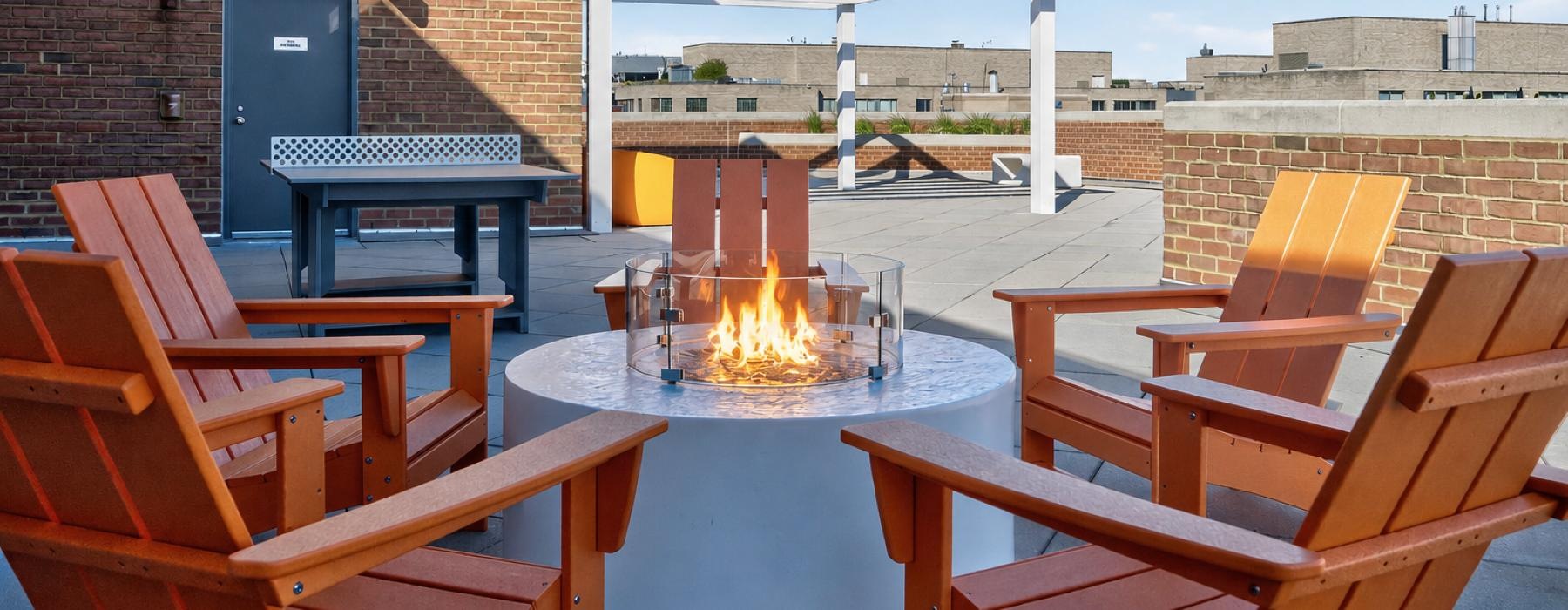 fire pit surrounded by chairs