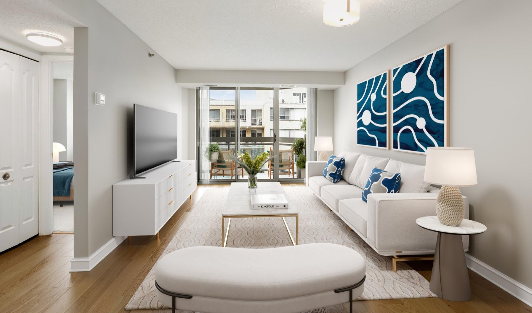 a living room with access to private patio