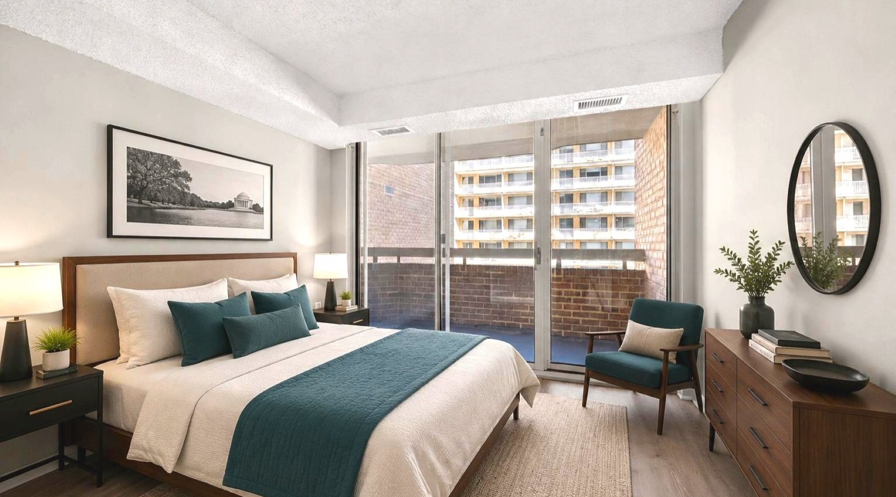 bedroom with a large window and modern decor